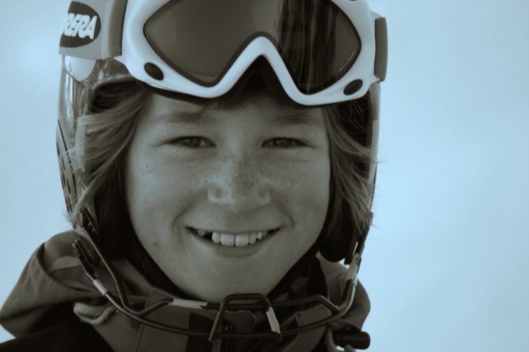 Young Heiner smiling under his goggles