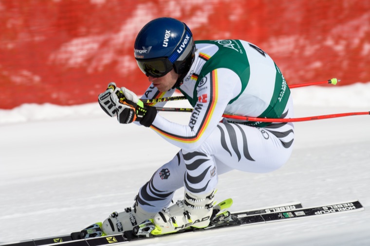 Heiner Laengst in a low tuck during a downhill race