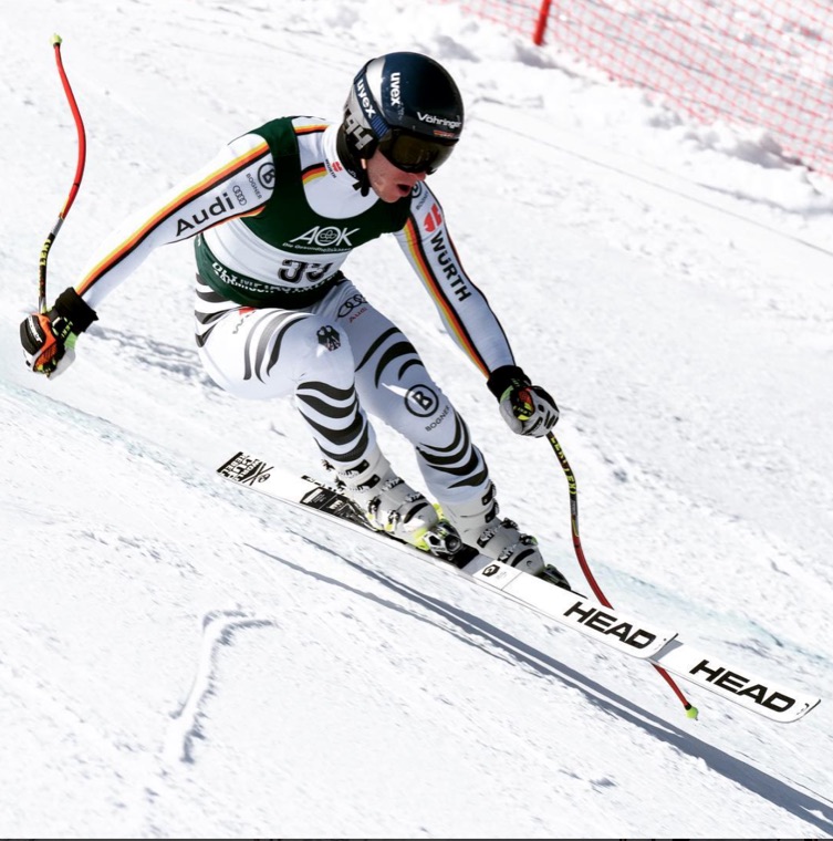 Leaning into a turn on a sunny race course