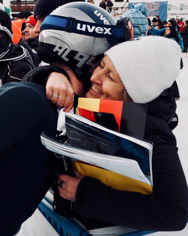 A hug in the finish area